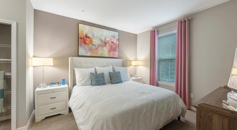 a bedroom with a large bed