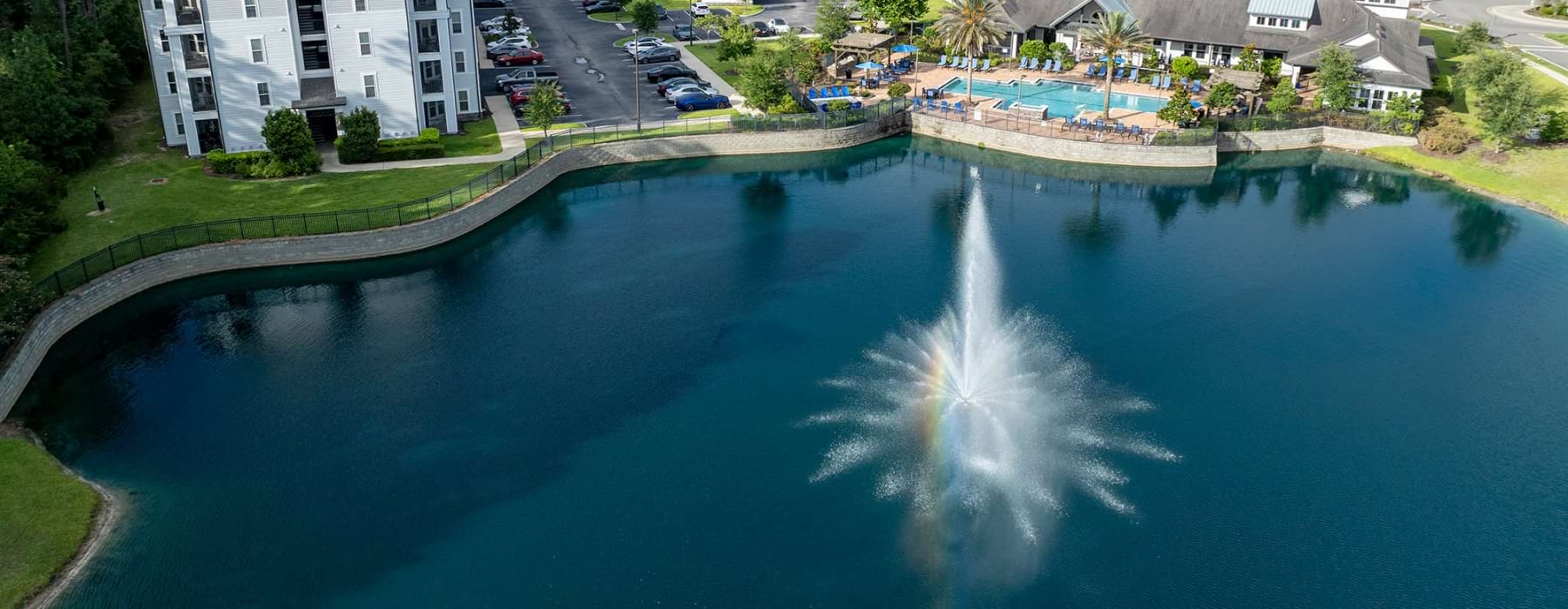 fountain in the middle of pond